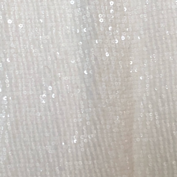 Sparkle in this white sequinned mid-length skirt! - Picture 2 of 5